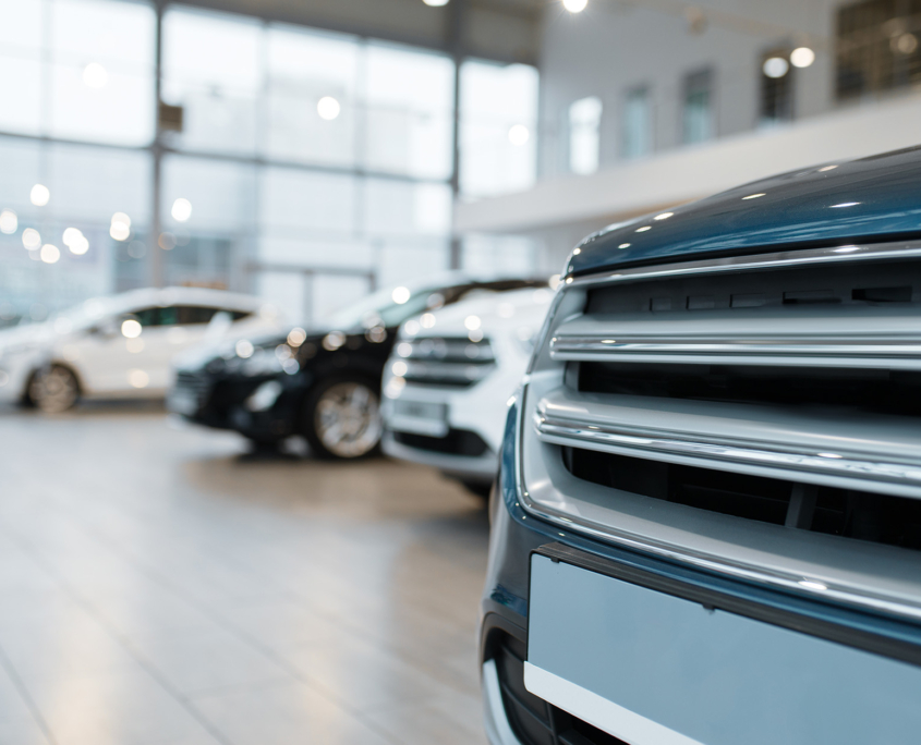 Side view of cars in dealership